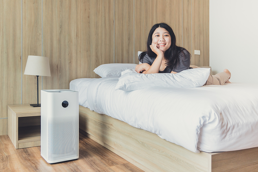 Woman At Home Bedroom Happy Enjoy With Air Purifier For Clean Pm