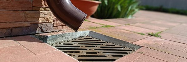 Plastic Drain Pipe With A Drain Pipe Shoe At The End. Attaches T