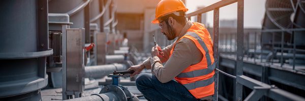 Industry Engineer Under Checking The Industry Cooling Tower Air